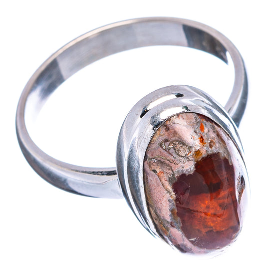 Sterling silver ring with oval fire opal bezel setting and red-orange stone, size 8.75