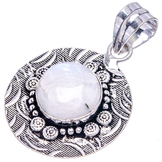 Round moonstone cabochon pendant in detailed leaf-and-dot metal setting, hanging bail above.