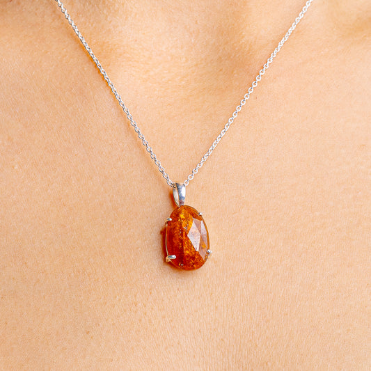Orange kyanite pendant necklace with oval stone on .925 sterling silver chain