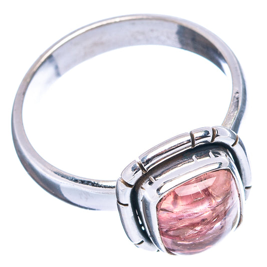Sterling silver ring with oval pink gemstone, side view of band and setting