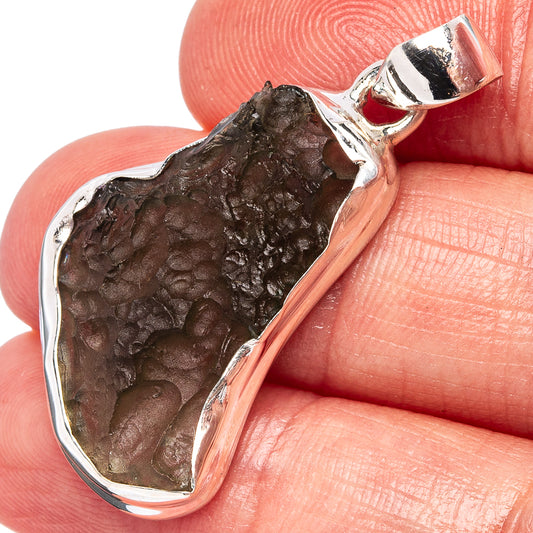Rare moldavite pendant in .925 sterling silver, dark brown teardrop stone bezel