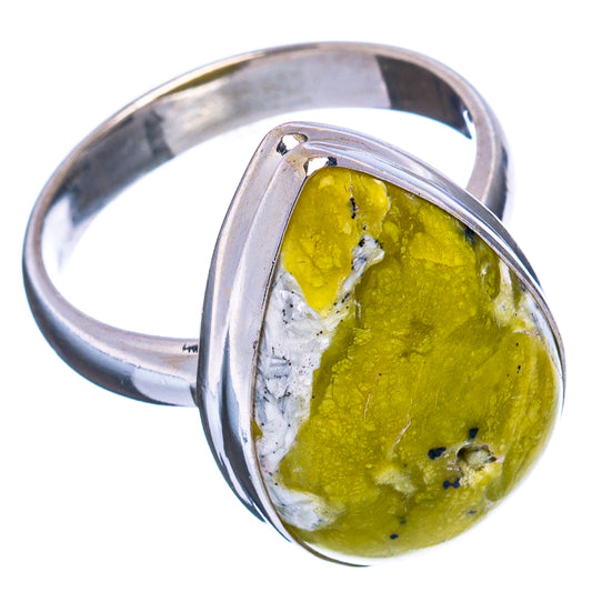 Sterling silver lizardite ring showing yellow gemstone cabochon and high-shine band