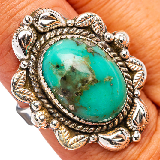 Turquoise oval cabochon ring in .925 sterling silver with ornate leaf and bead settings