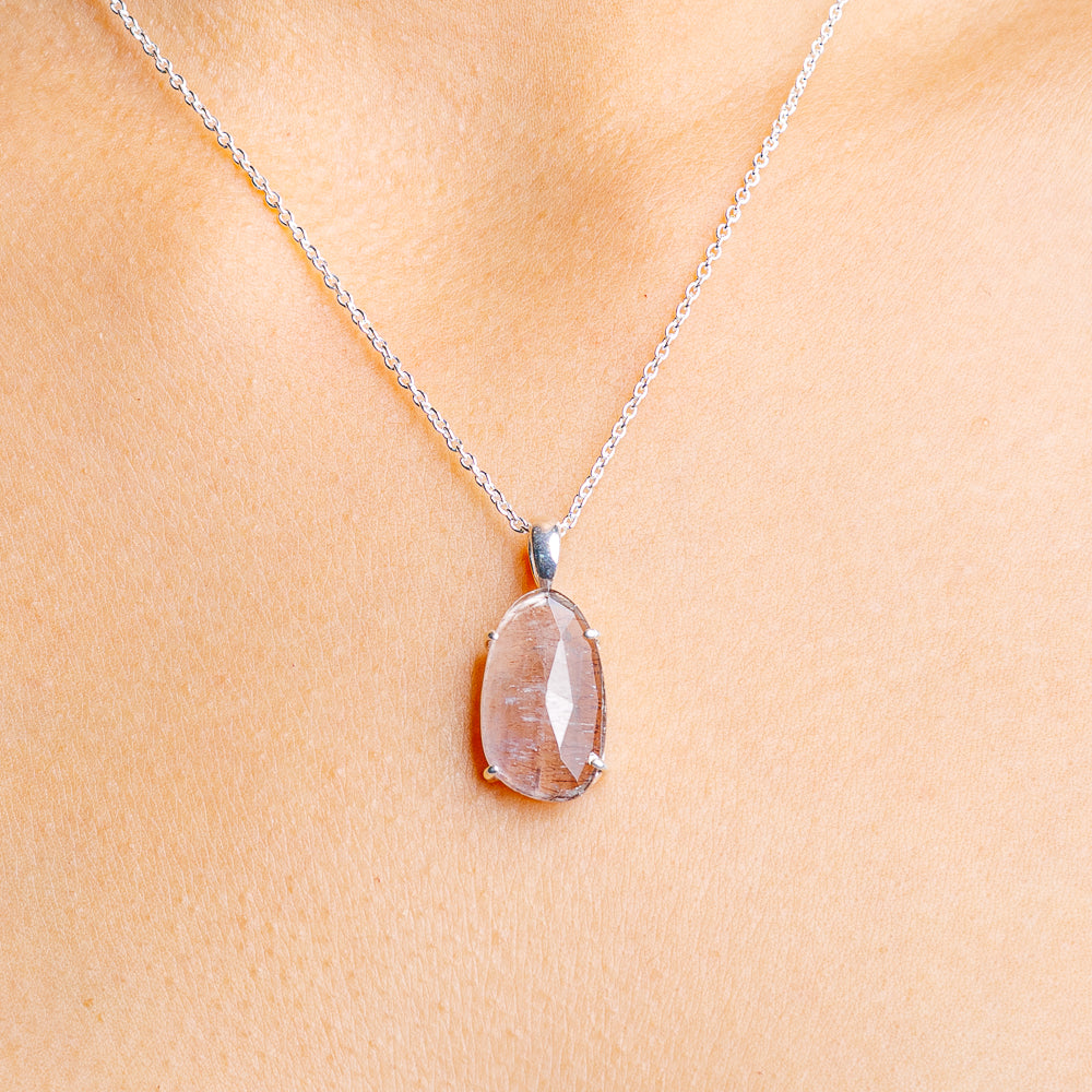 Sterling silver cacoxenite necklace with oval faceted pink stone pendant