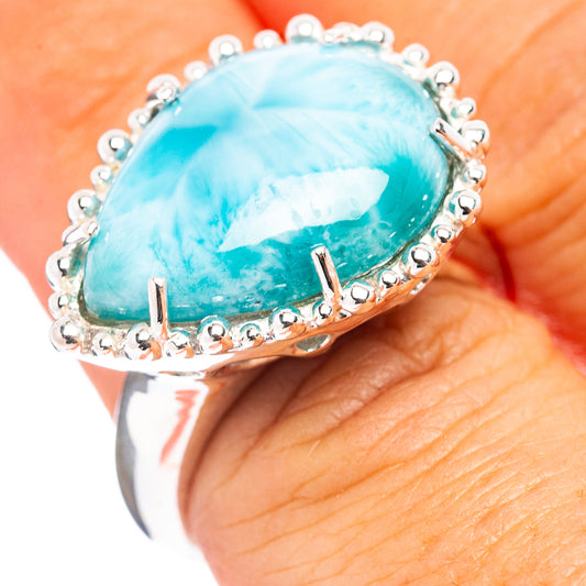 Oval larimar gemstone ring in .925 sterling silver with prong halo bezel