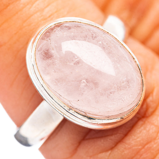 Oval pink kunzite gemstone set in .925 sterling silver ring, size 7
