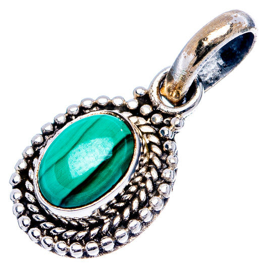 Oval malachite-green stone pendant with ornate textured silver bezel and loop bail