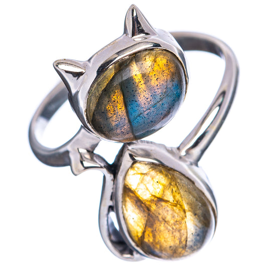 Sterling silver cat ring with two oval labradorite gemstones, blue-gold flash.