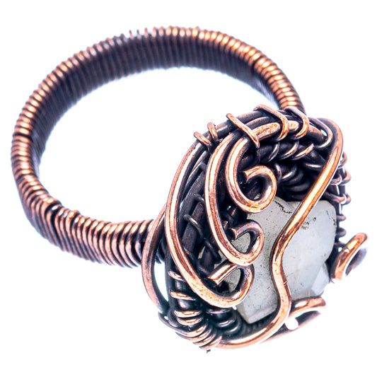 Oxidized copper wire wrap ring with white moonstone, coiled black and copper band details