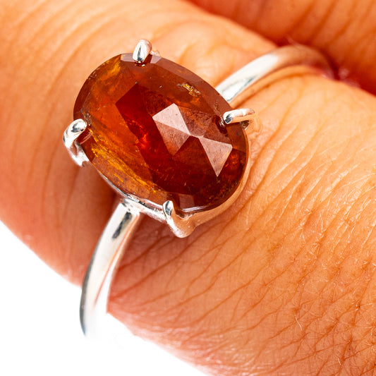 Orange kyanite sterling silver ring, faceted oval gemstone in four prongs