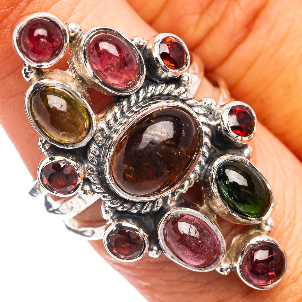 Sterling silver multi-color tourmaline ring with dark amber center and red stone accents