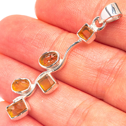 Sterling silver citrine pendant with oval and square faceted stones, loop bail top