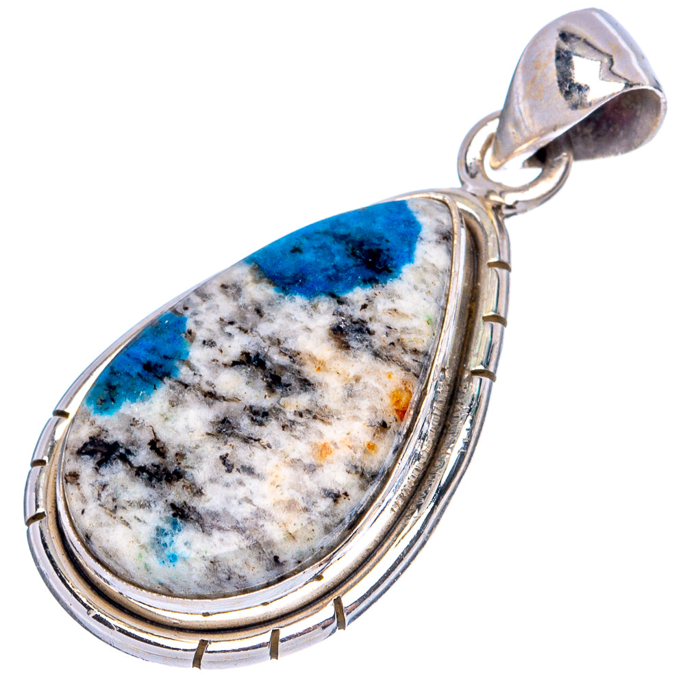 Sterling silver teardrop pendant with blue azurite cabochon and decorative frame