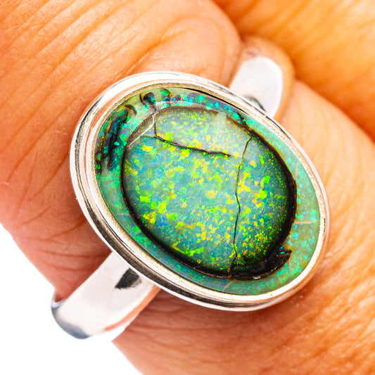 Oval opal gemstone ring in .925 sterling silver, bezel-set, green-blue shimmer