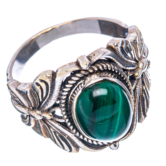 Sterling silver malachite cabochon ring with butterfly and leaf engravings, wide band.