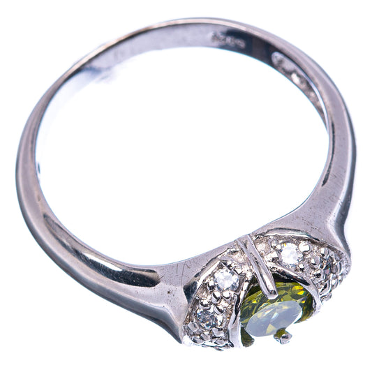 Sterling silver peridot cubic zirconia ring with oval green stone and clear stone halo