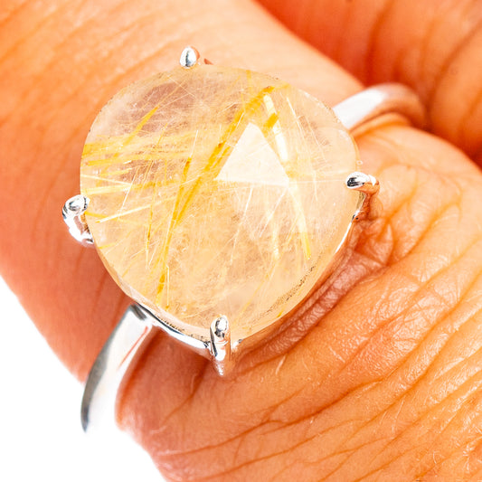 Sterling silver ring with round rutilated quartz gemstone in four prongs