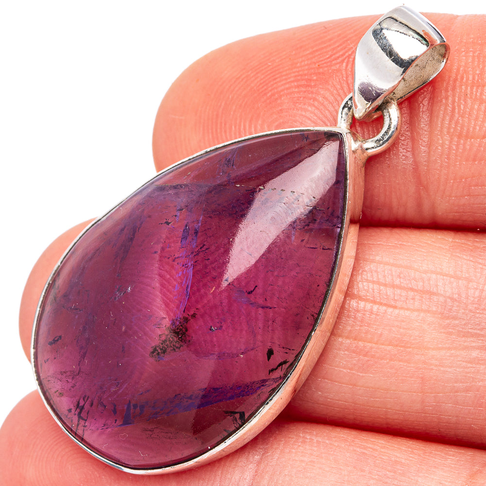 Amethyst teardrop pendant in .925 sterling silver, faceted purple stone