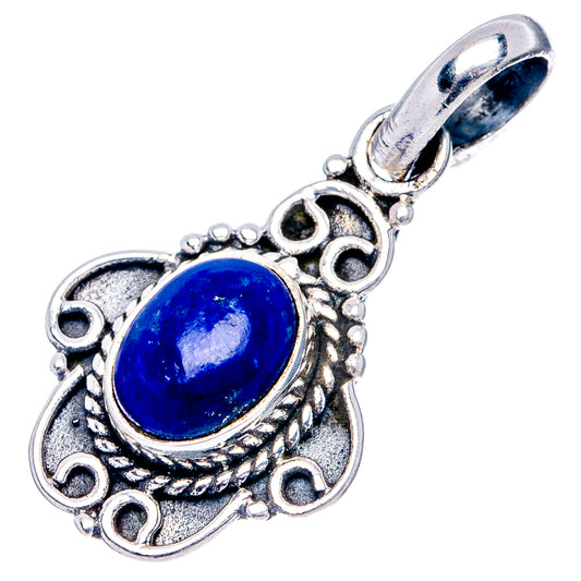 Sterling silver lapis lazuli pendant, oval blue stone in decorative round filigree frame