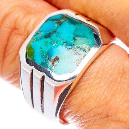 Sterling silver turquoise ring with octagonal stone, worn on finger