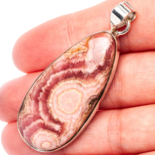 Rhodochrosite pendant in .925 sterling silver bezel, teardrop pink-and-white stone