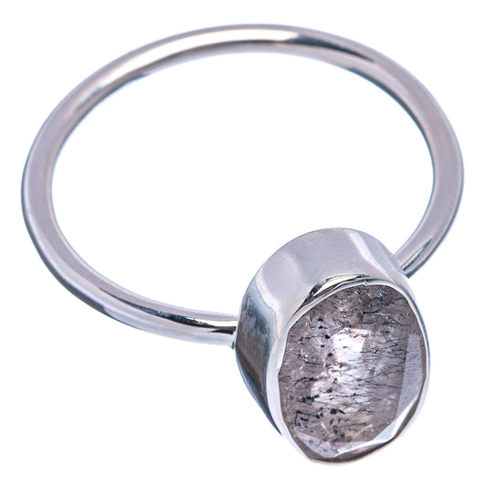 Sterling silver bezel ring with oval cacoxenite cabochon, side view of band
