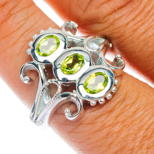 Sterling silver peridot three-stone ring with scalloped bezels, size 9