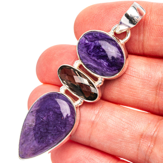 Sterling silver pendant with oval purple charoite and dark smoky quartz stones