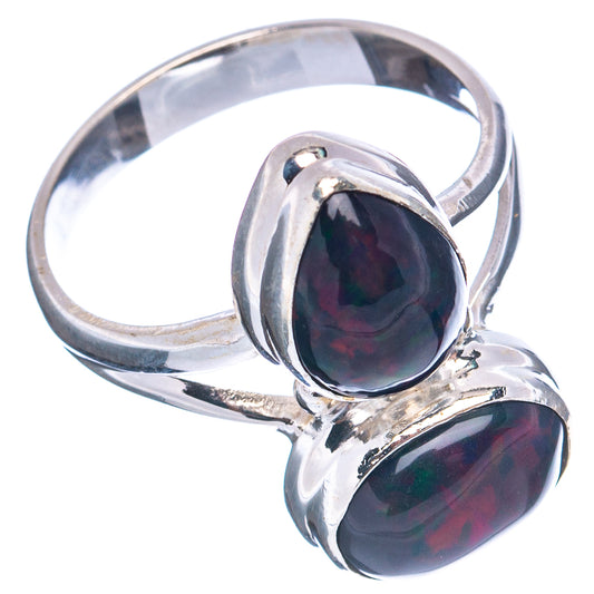 Sterling silver opal ring, side view, oval dark cabochons stacked in a bypass band