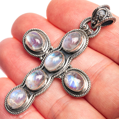 Sterling silver cross pendant with five oval opalescent moonstone-style stones