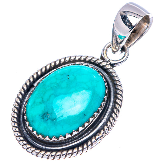 Oval turquoise cabochon pendant with sterling silver rope frame and bail