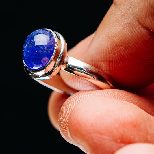 Blue oval gemstone sterling silver ring, shiny band with side profile detail