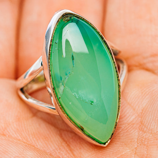 Oval green chrysoprase gemstone ring in silver with raised bezel edge detail