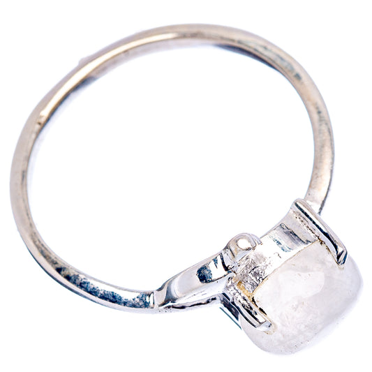 Sterling silver band with oval moonstone set in bird-like openwork mount