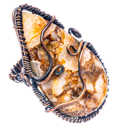 Oxidized copper wire wrap ring, oval stone with amber speckles and curled wire band