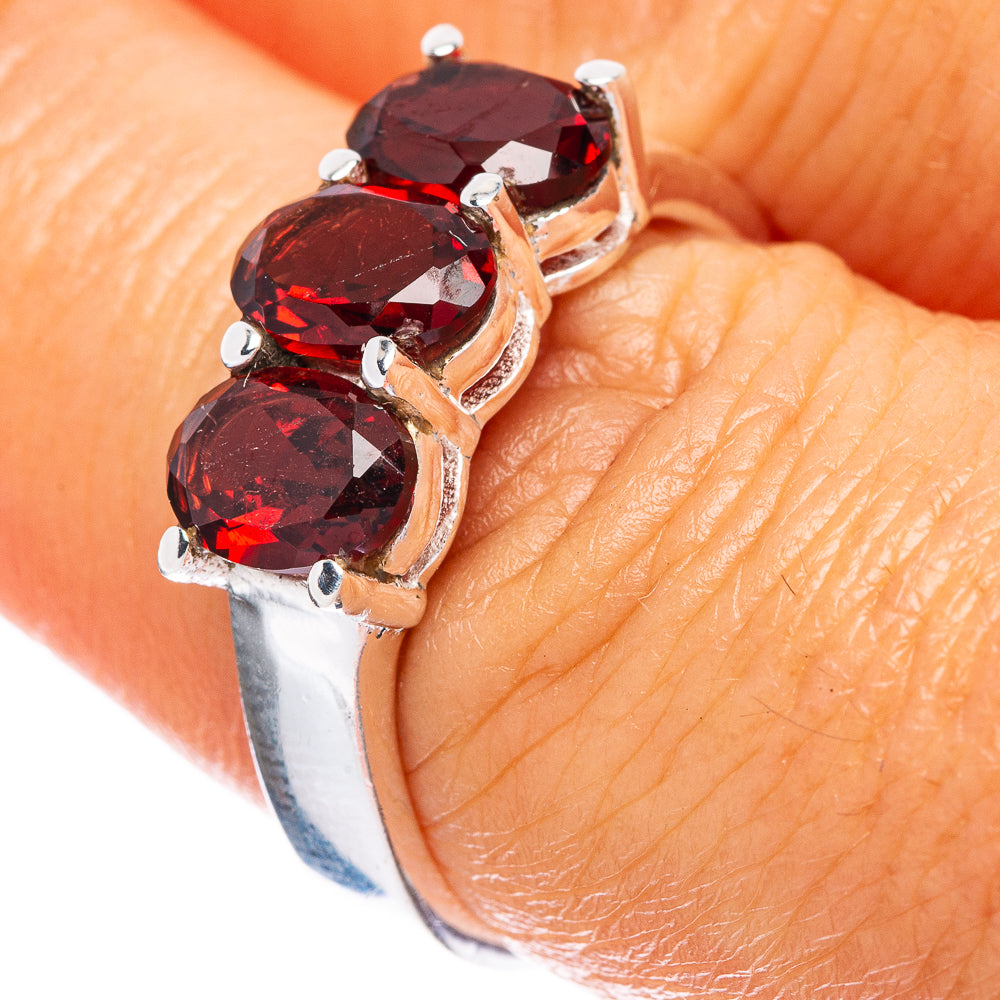 Dainty garnet ring with three marquise-cut red stones on 925 sterling band