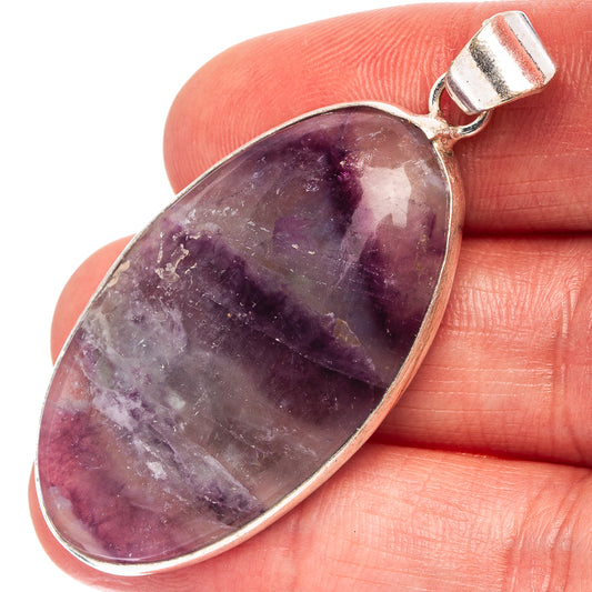 Silver-plated oval pendant with dark purple amethyst stone and metal bail