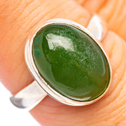Oval green nephrite jade cabochon ring in .925 sterling silver bezel