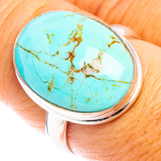 Oval turquoise cabochon sterling silver ring with brown webbed matrix detail