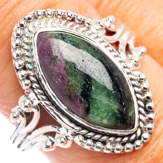Sterling silver gemstone ring with oval purple-green stone and beaded halo, size 7.75