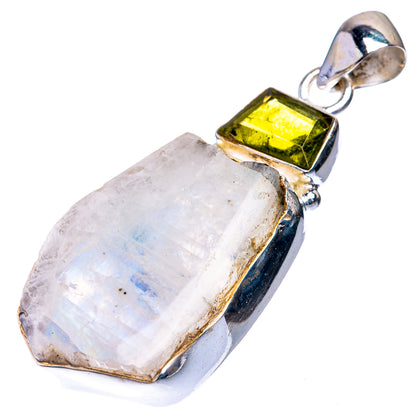 Sterling silver pendant with green peridot inset on rough moonstone, rectangular frame