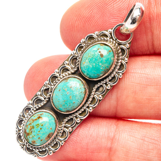 Turquoise pendant with three oval cabochons in ornate .925 sterling silver setting