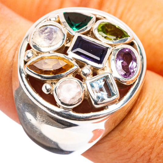 Sterling silver ring with faceted multi-color gemstones, openwork setting close-up