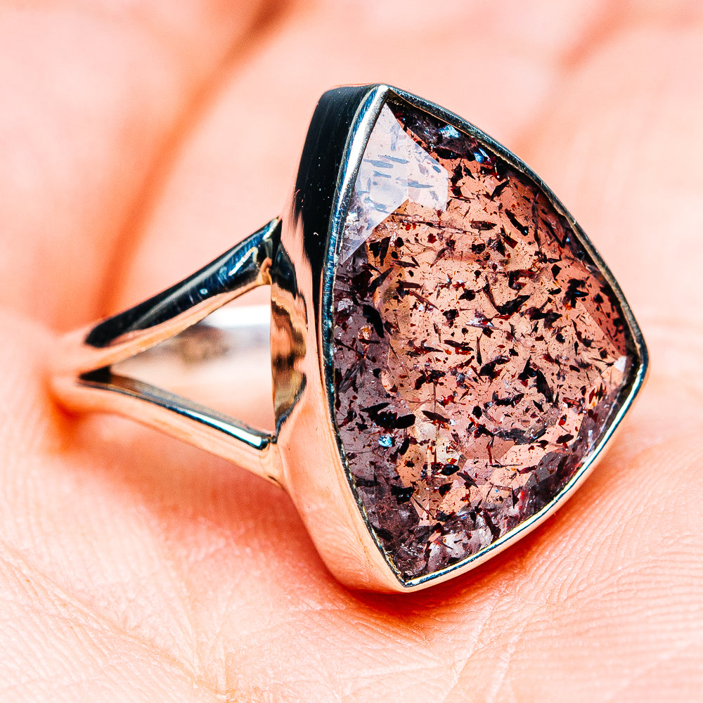 Size 8.75 sterling silver ring with faceted marbled pink-purple gemstone in bezel setting