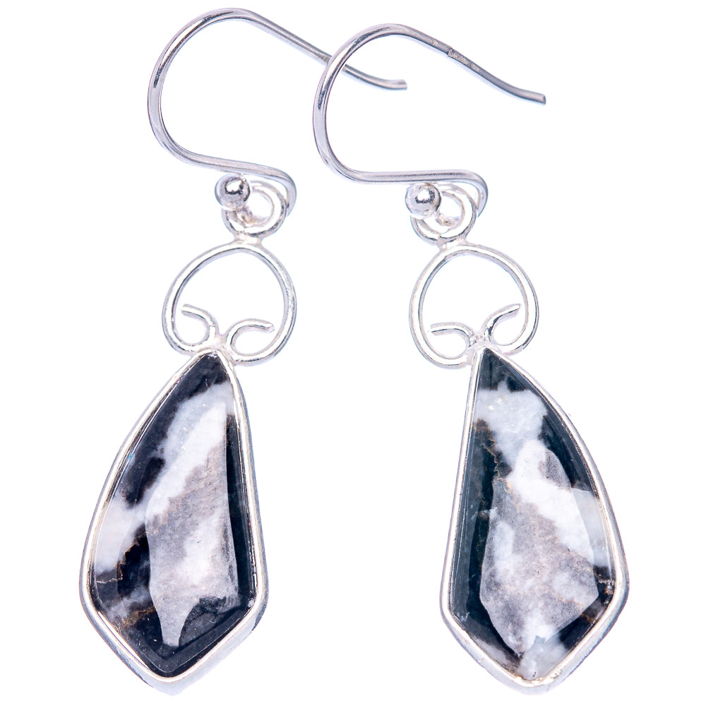 Sterling silver teardrop earrings with heart-shaped frame and black-and-white stone drops