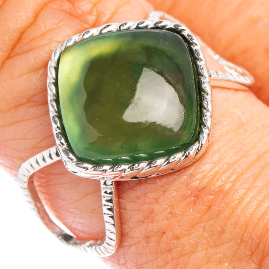 Sterling silver nephrite jade ring, oval green gemstone in braided bezel