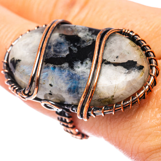 Oxidized copper wire wrap ring with dark speckled oval cabochon