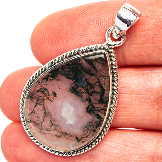 Teardrop moss agate pendant in polished .925 sterling silver with braided edge bezel