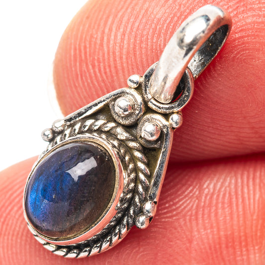 925 sterling silver pendant with oval labradorite cabochon and ornate bail