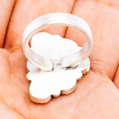 Sterling silver adjustable ring band with cutout back and small engraved details